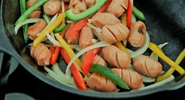 Sausage sautéed with sweet and sour bell peppers